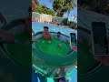 JUMPING INTO A HOT TUB FULL OF SLIME!! #shorts